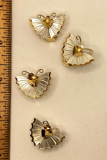 Two pairs of vintage 1970's Mother of Pearl butterfly clip on earrings.