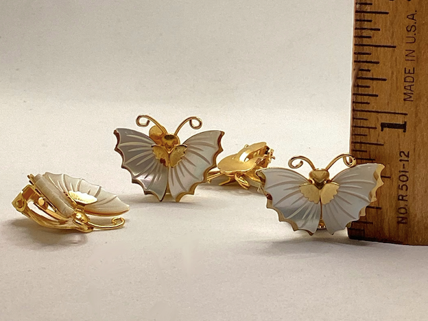 Two pairs of vintage 1970's Mother of Pearl butterfly clip on earrings.