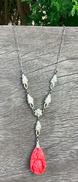 One vintage, Art Deco 1930's silver-tone and soft peach necklace.