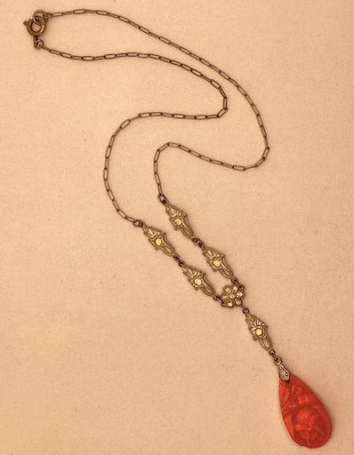 One vintage, Art Deco 1930's silver-tone and soft peach necklace.