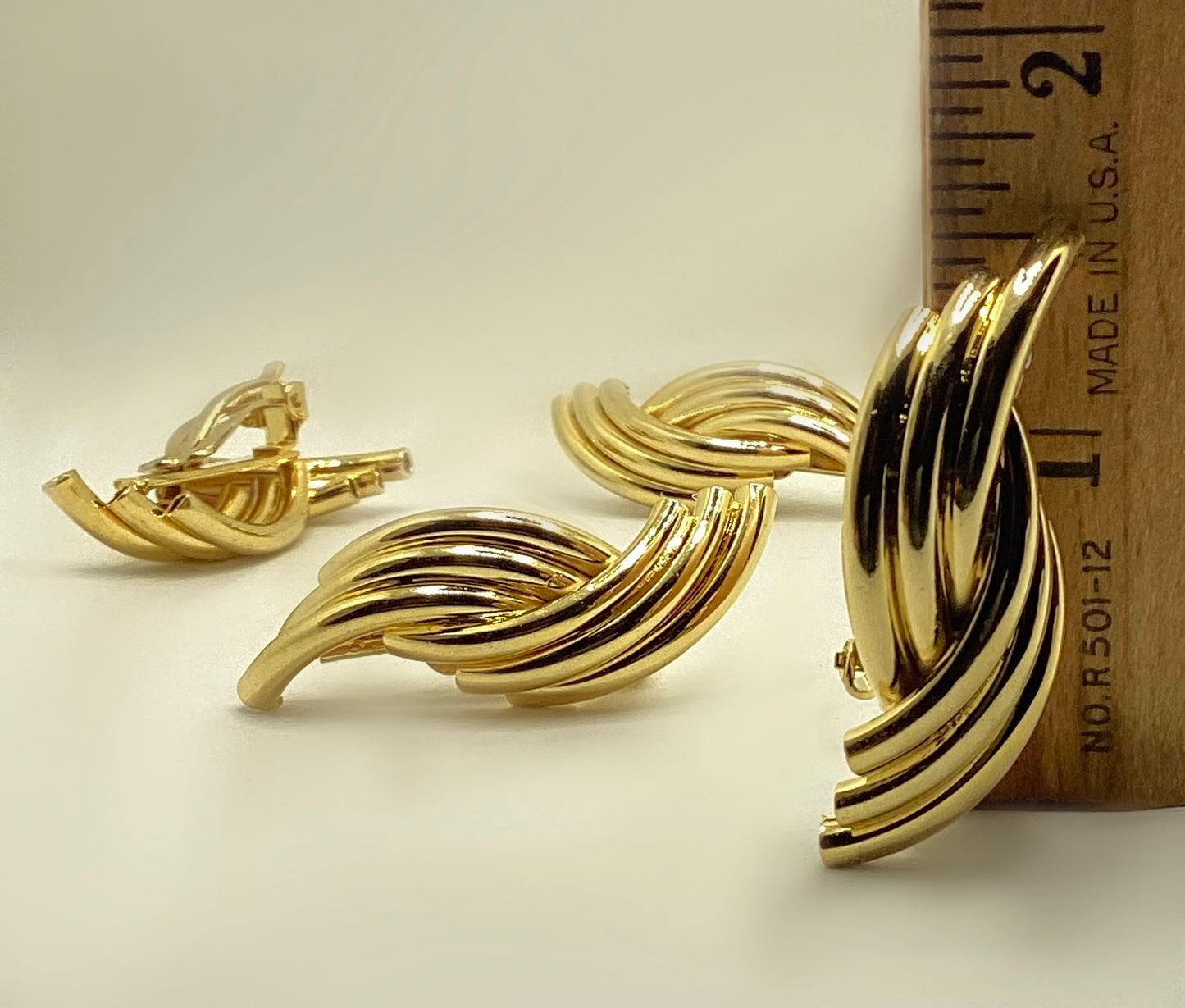 Two pairs of vintage 1980-90's gold plated twisted and ribbed clip-on earrings