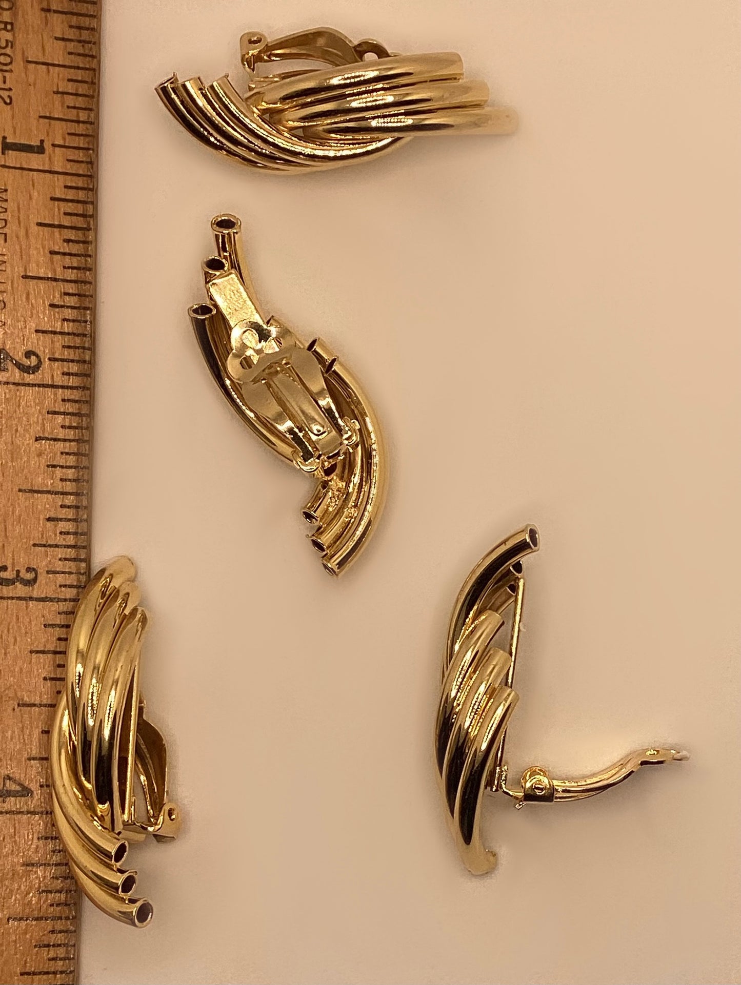 Two pairs of vintage 1980-90's gold plated twisted and ribbed clip-on earrings