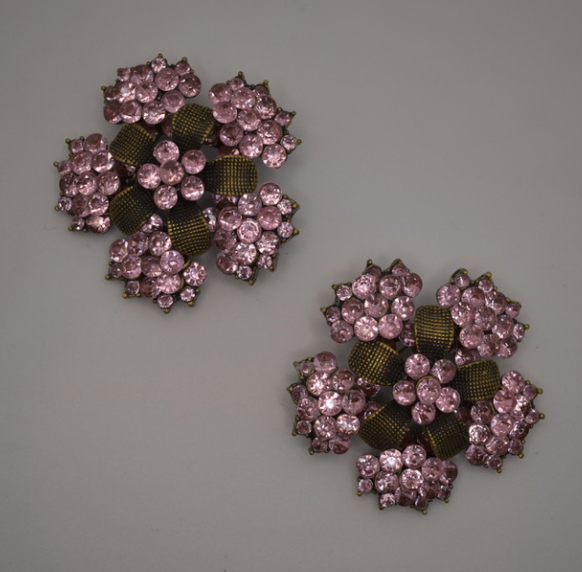 Two vintage reproduction pink rhinestone and brass brooches