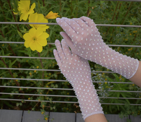 Two pairs of vintage cream lace gloves with iridescent sequins