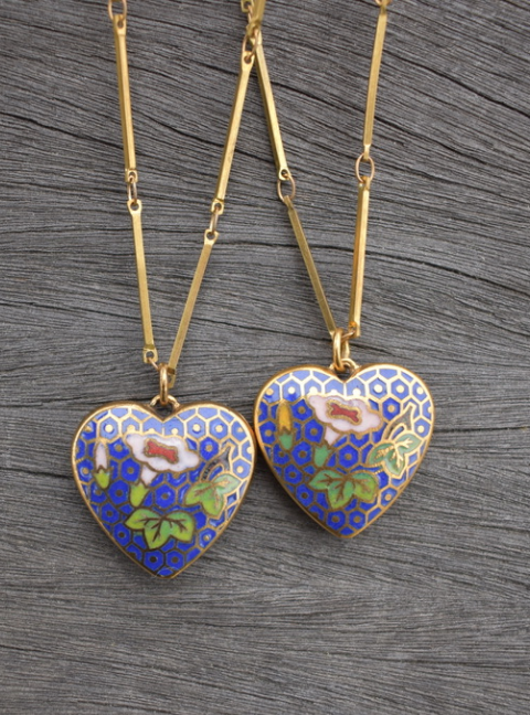 Two 1970's-90's vintage blue cloisonne heart pendants on a gold tone chain