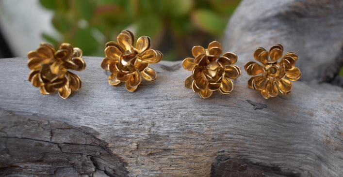 Two pairs of 1930's vintage gold plated flower earrings