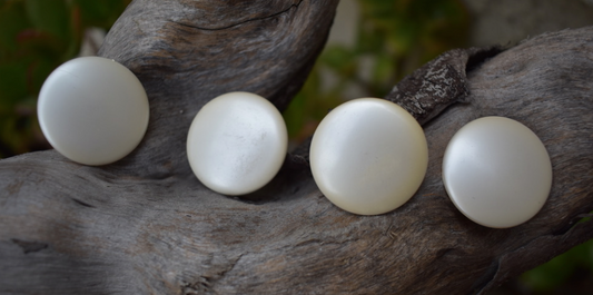 Two pairs of 1950's-60's vintage cream faux pearl 1" round earrings