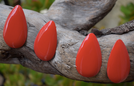 Two pairs of 1980's vintage red tear drop shapped metal earrings