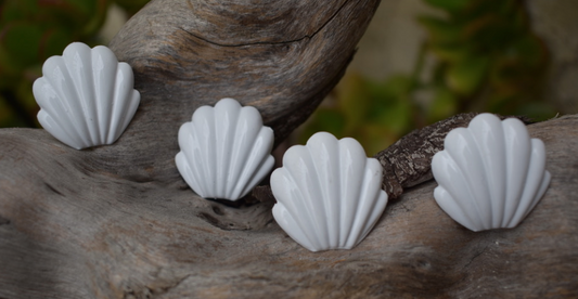 Two pairs of 1980's vintage white, shell shaped, metal earrings