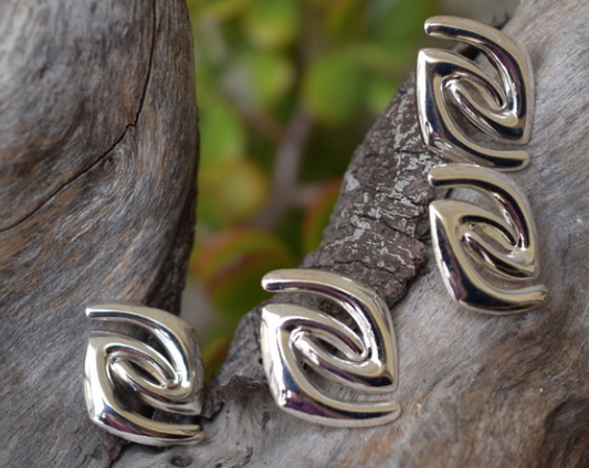 Two pairs of 1980's vintage abstract silver metal earrings