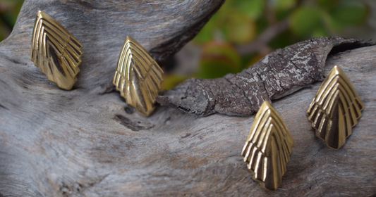 Two pairs of 1980's vintage art deco revival gold tone metal earrings
