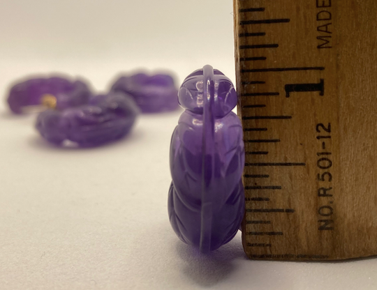 Two pairs of 1980's vintage purple lucite hoop earrings