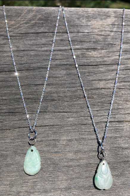 Two Qing Dynasty (circa 1644-1911) vintage hand carved jadite pendants on sterling silver chain