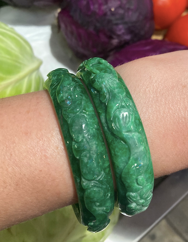 Two matching 1970's-80's vintage hand carved jade bangles