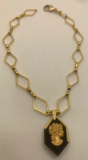 One 18K Gold Plated Bracelet with Vintage Black and Gold Cameo Charm