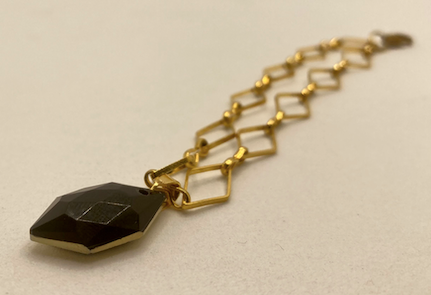 One 18K Gold Plated Bracelet with Vintage Black and Gold Cameo Charm