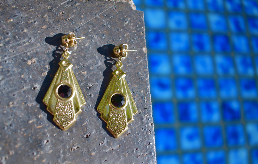 One pair of vintage reproduction art deco gold tone earrings