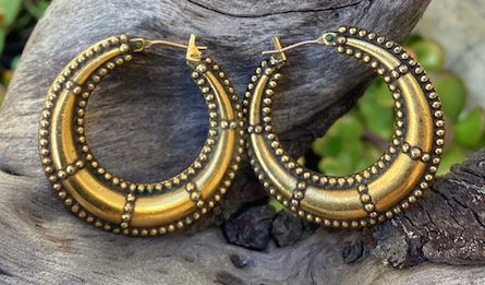 One pair of 1990's vintage YSL gold tone hoop earrings