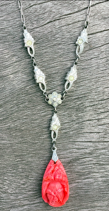 One vintage, Art Deco 1930's silver-tone and soft peach necklace.