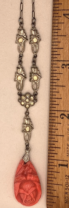One vintage, Art Deco 1930's silver-tone and soft peach necklace.
