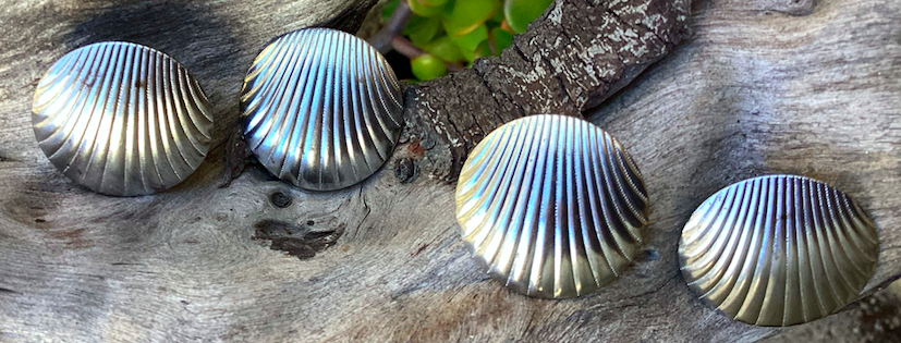 Two pairs of vintage 1980's silver tone seashell shaped earrings